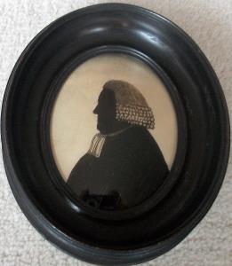shilouette reverse painted onto convex glass